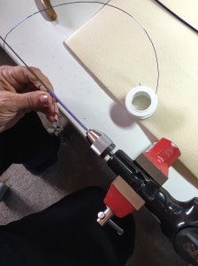 Wrapping a mandrel with a wire spring