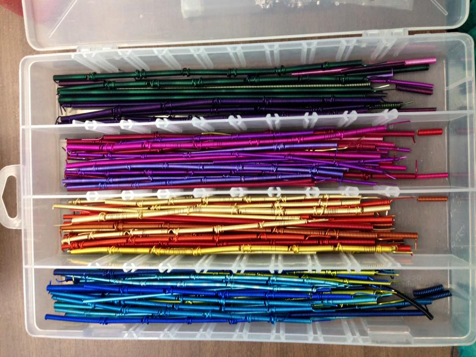 Box of colorful art wire springs