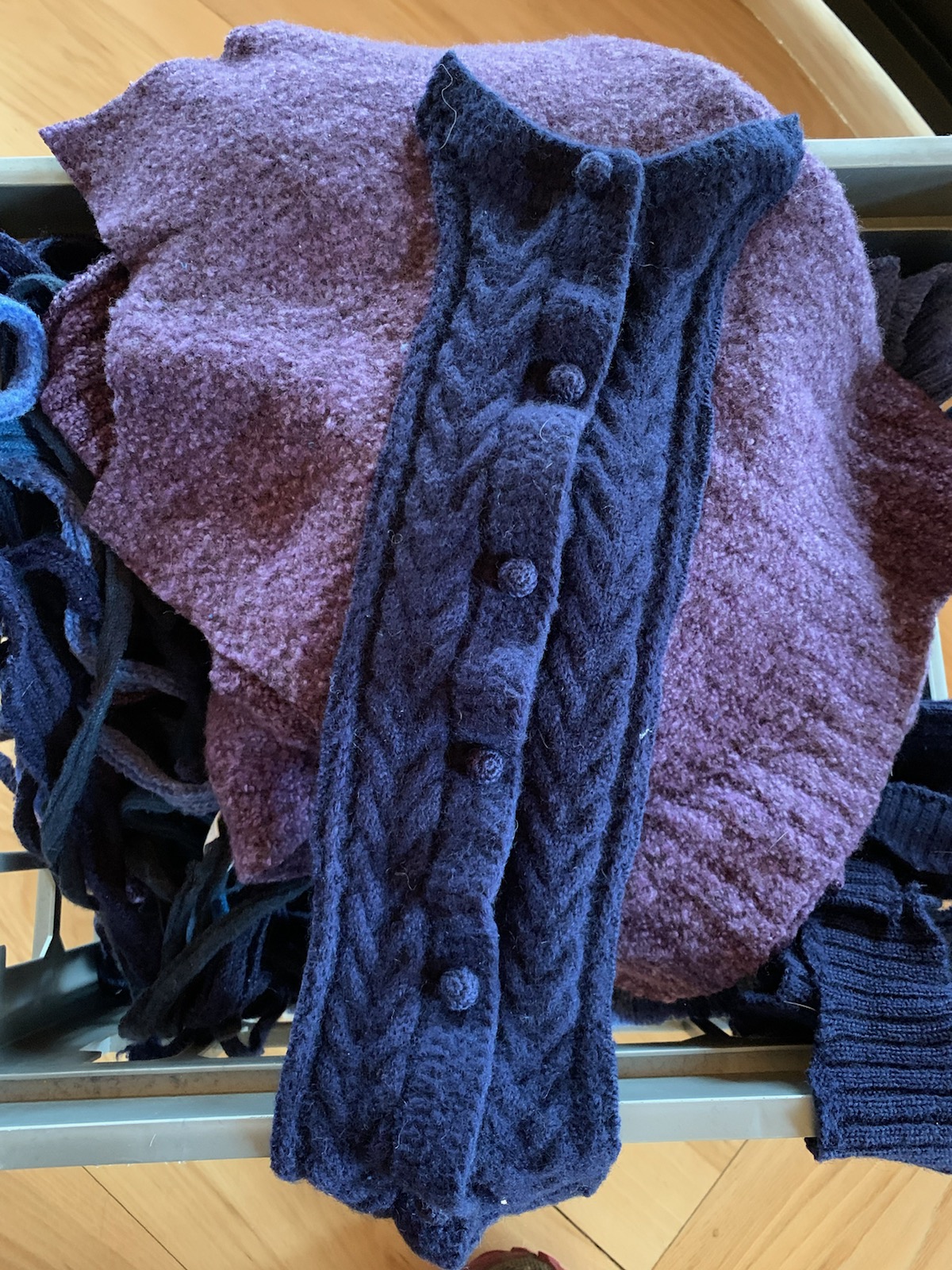 cut up, felted purple and blue sweaters